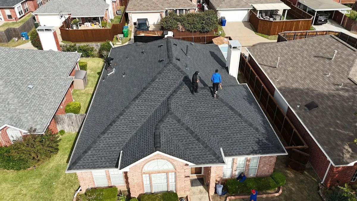 Slate & Tile Roof Repair work in progress on a Des Plaines property